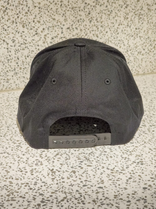 The back of an Untitled Art Patch Logo Hat – Black.