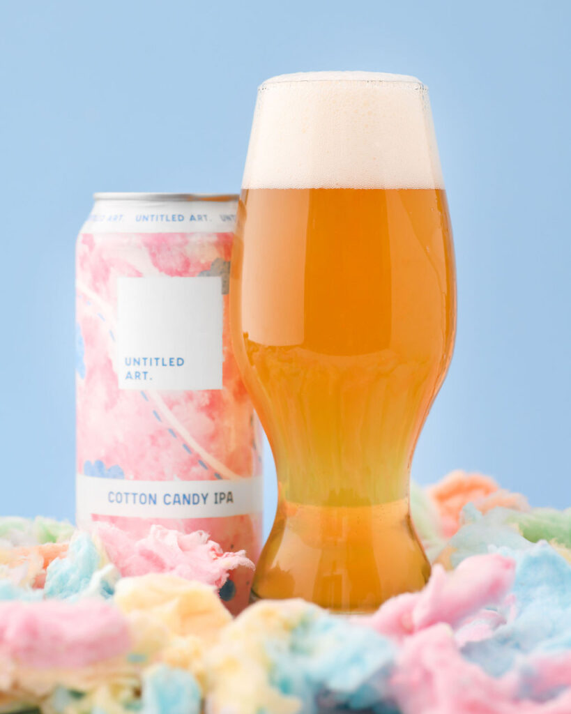 A can of cotton candy ipa on a blue background.